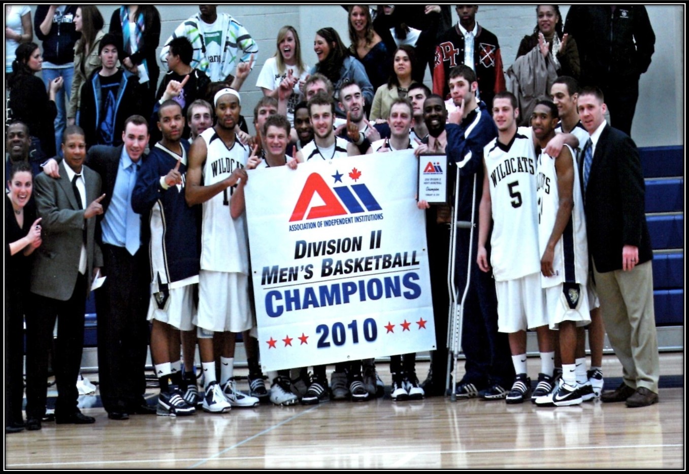 Ethan Fisher with Conference Championship Team