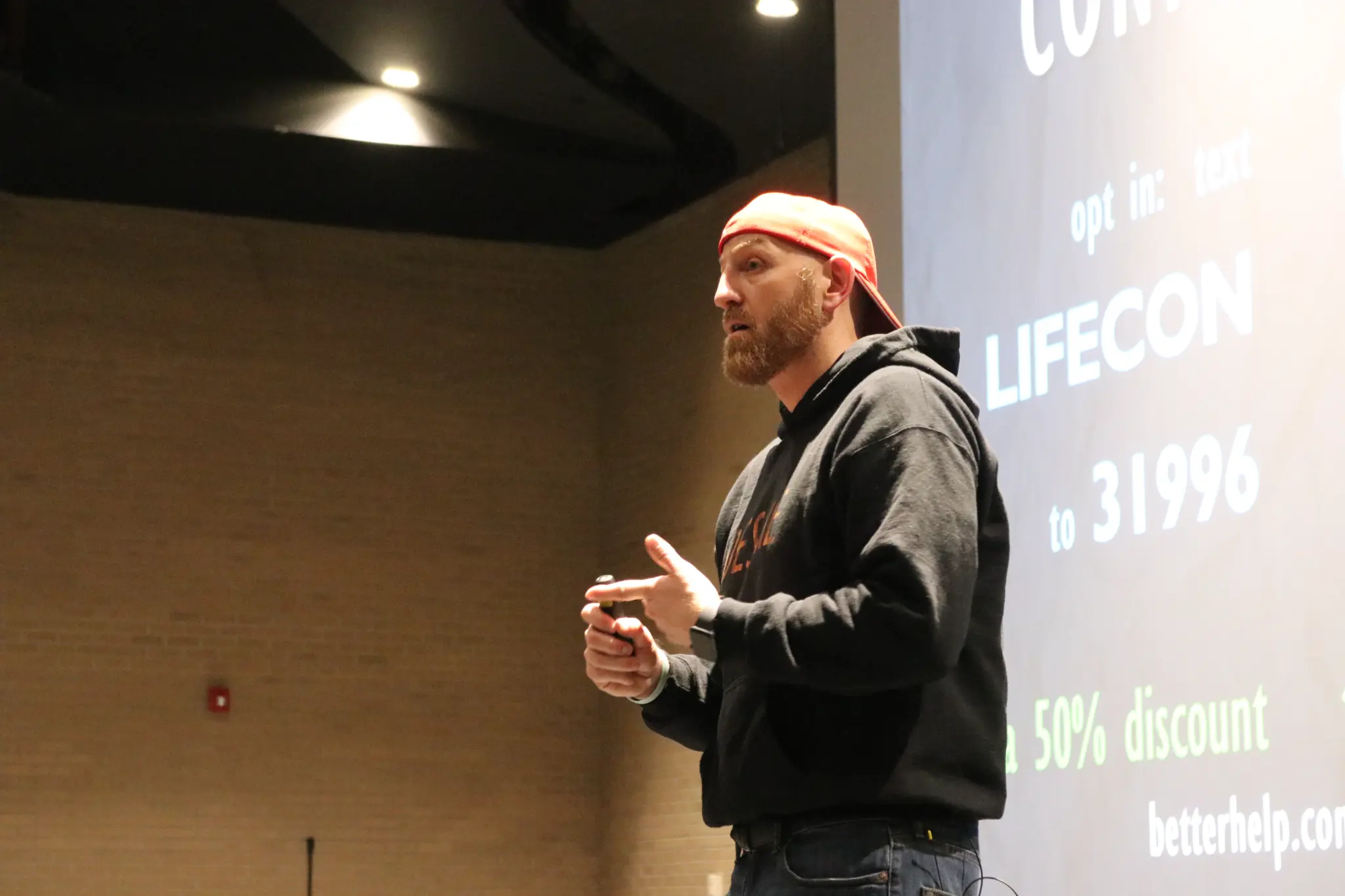 Ethan Fisher Speaking at UNLV with Backwards Hat
