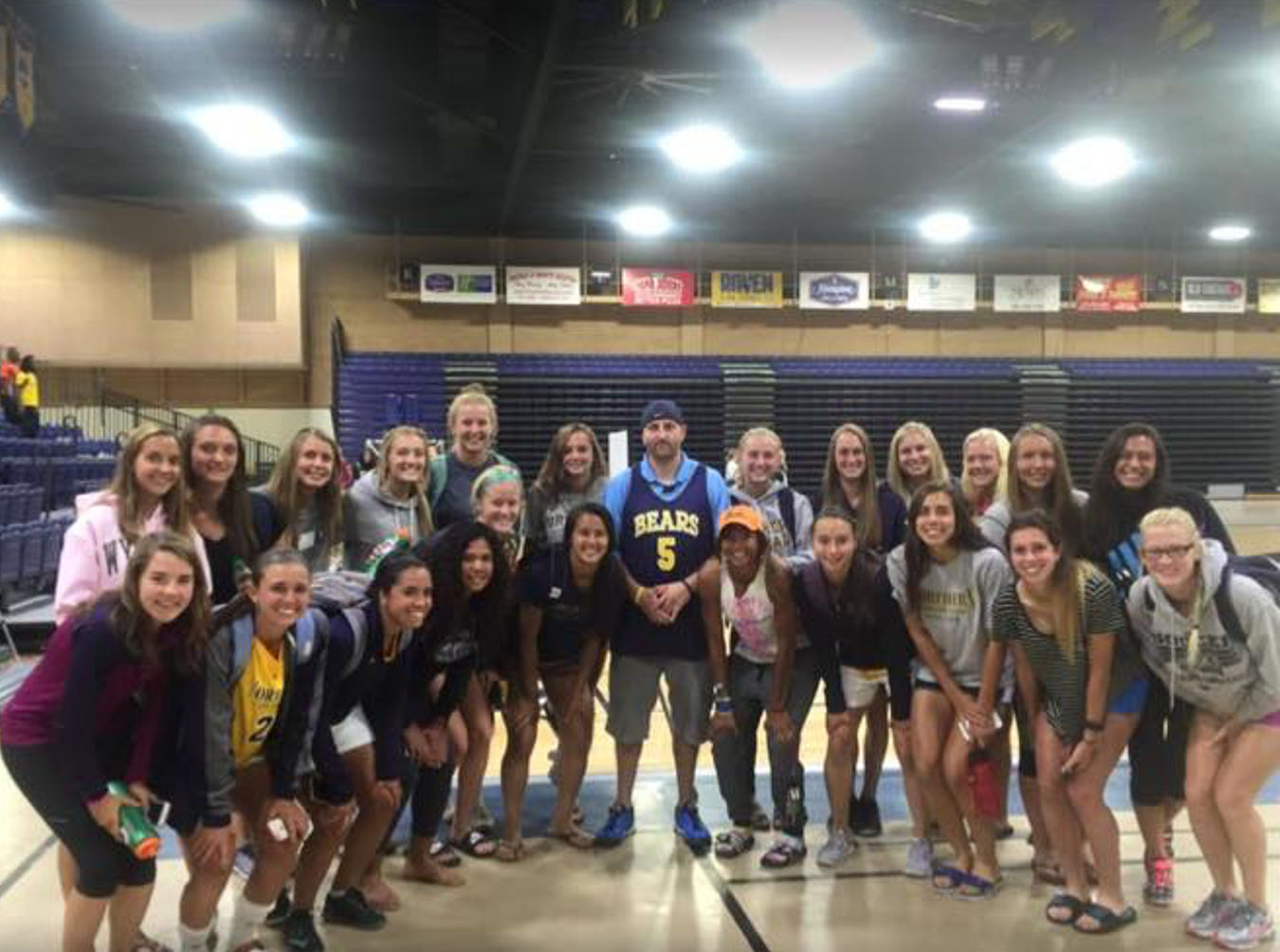 Ethan Fisher with Women's Soccer Team
